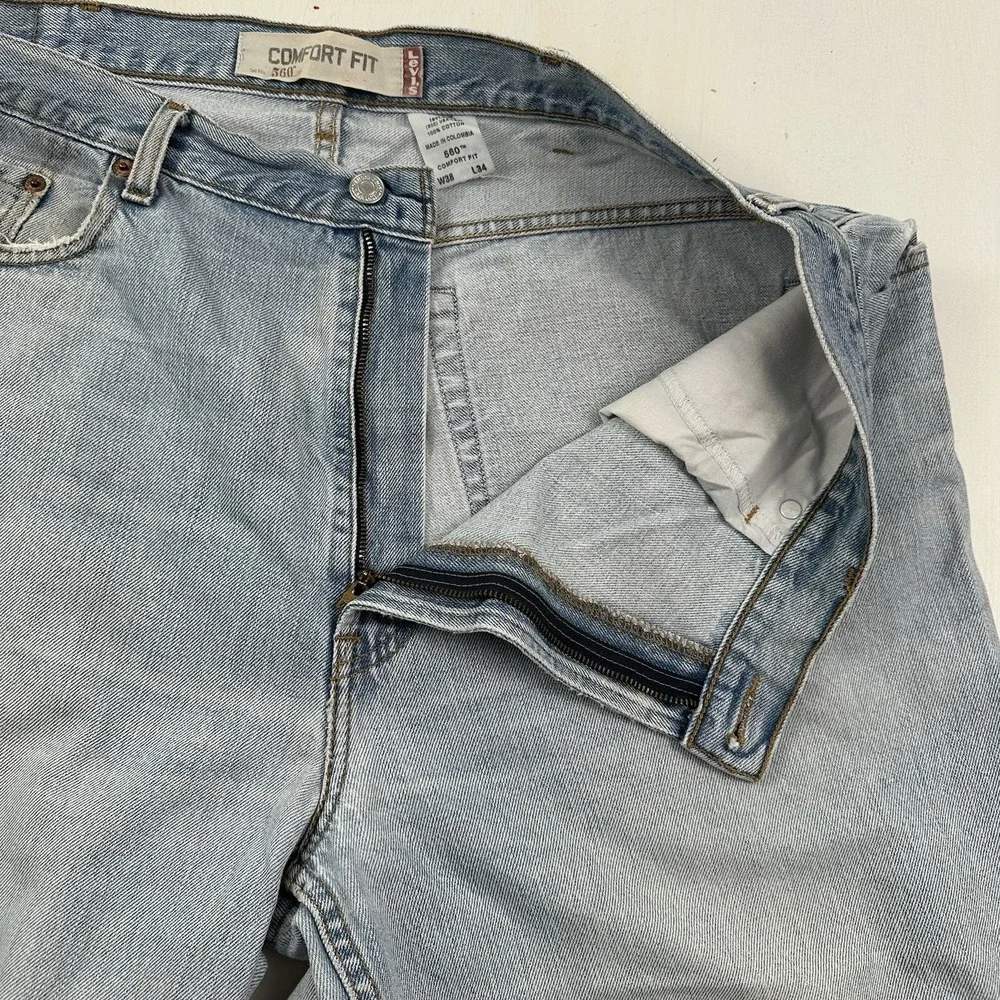 VTG‎ Levi's 560 Comfort Fit 38x34 Tapered Loose Jeans Light Wash Distressed Y2K